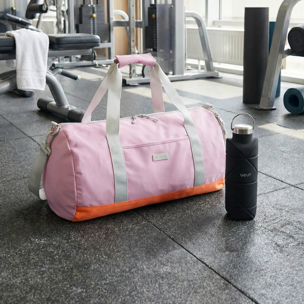 Combo Bolso Saxoline Lila + Botella Plegable Gout Negra